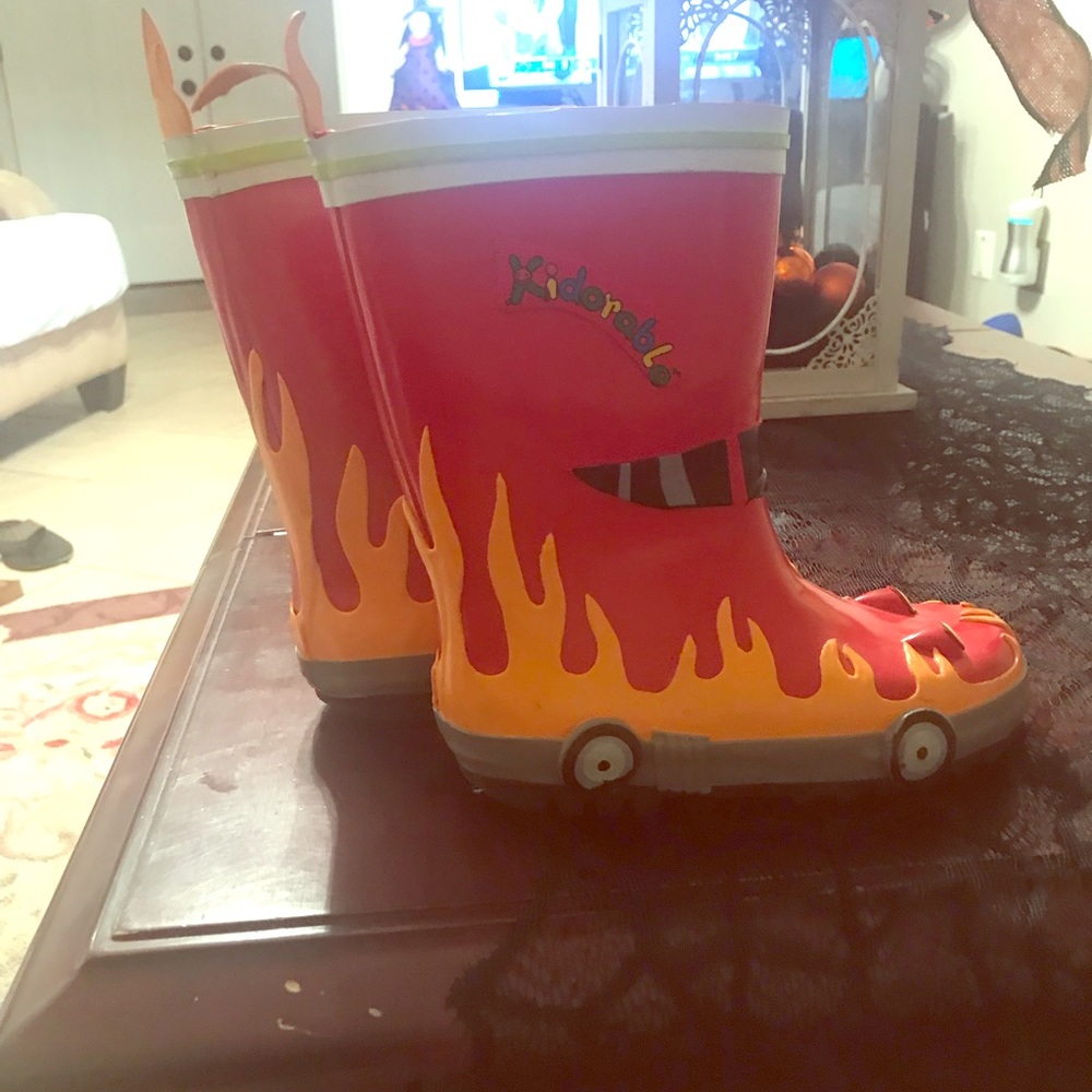 Little boy fire truck rain boots